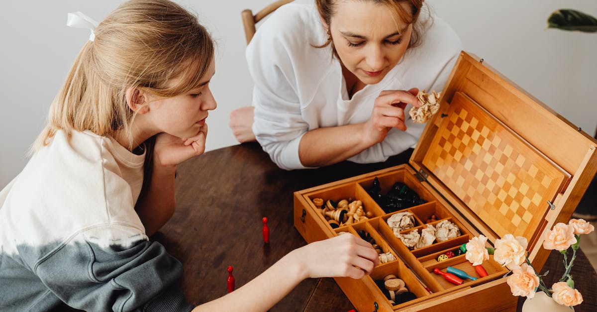 Cannot launch the game via Wineskin - Mother and Daughter Playing Game on Table Cannot launch the game via Wineskin - Mother and Daughter Playing Game on Table