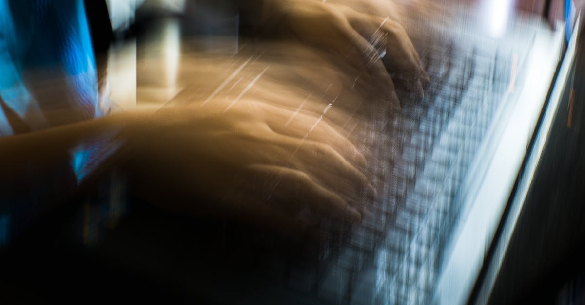 Cannot use Rapid fire button with RMB - From above of crop anonymous person typing on keyboard of laptop in long exposure Cannot use Rapid fire button with RMB - From above of crop anonymous person typing on keyboard of laptop in long exposure