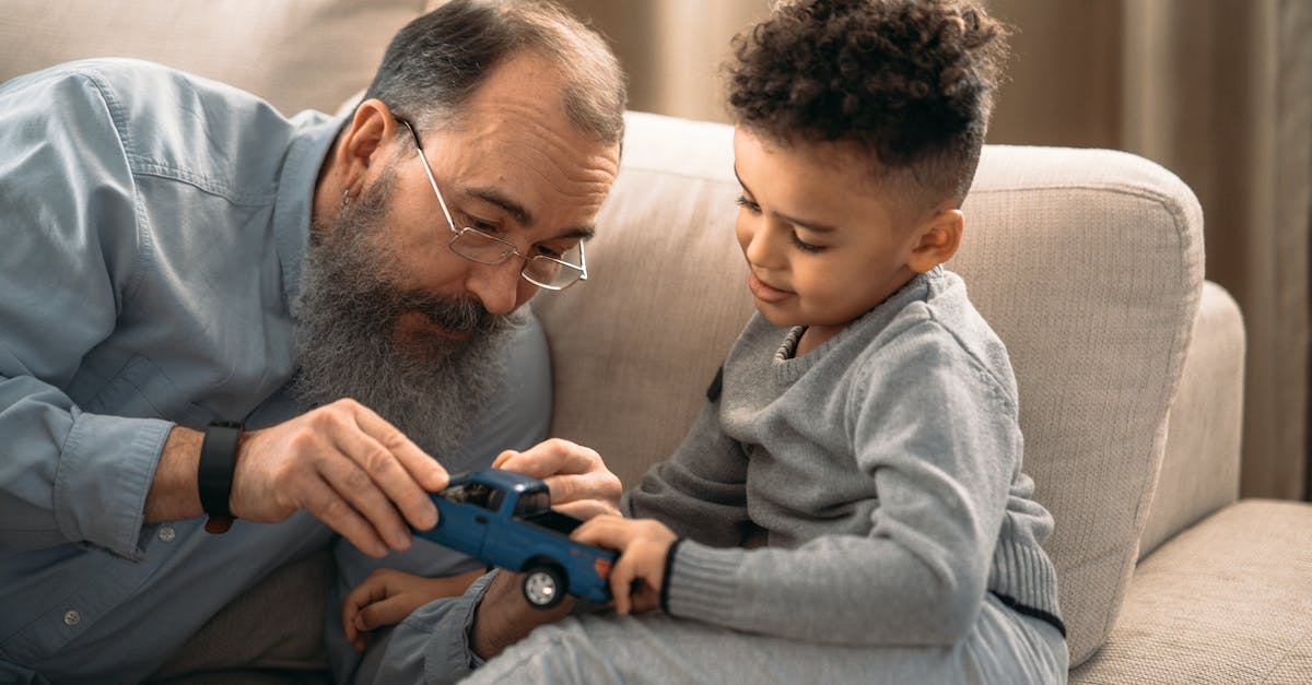 Cant auto-attacks crit? - Boy in Gray Sweater Holding Blue Toy Car Cant auto-attacks crit? - Boy in Gray Sweater Holding Blue Toy Car