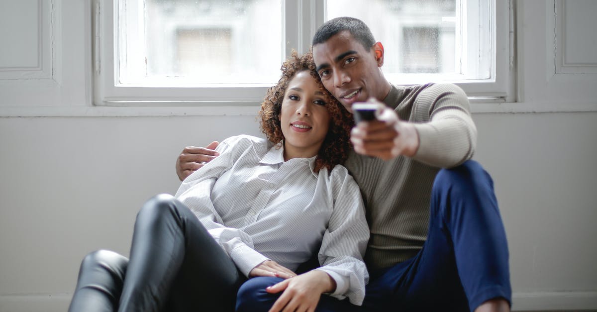 Change F3 Control in Minecraft? - Loving ethnic couple watching movie embracing on floor near window Change F3 Control in Minecraft? - Loving ethnic couple watching movie embracing on floor near window