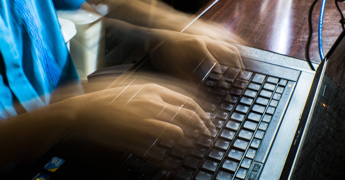 Change game speed in Stronghold with laptop keyboard without numpad - Crop unrecognizable man typing on laptop