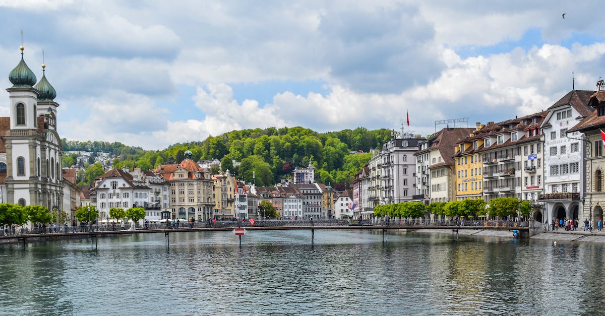Channelling/digging under a bridge - Calm river flowing in old town