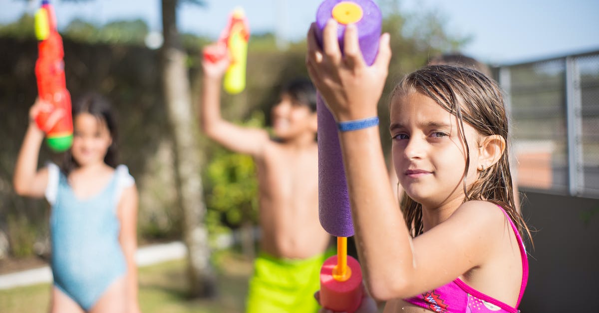 Charged shots shooting wrong way with controller - Girl in Pink Tank Top Holding Green and Yellow Plastic Toy Charged shots shooting wrong way with controller - Girl in Pink Tank Top Holding Green and Yellow Plastic Toy