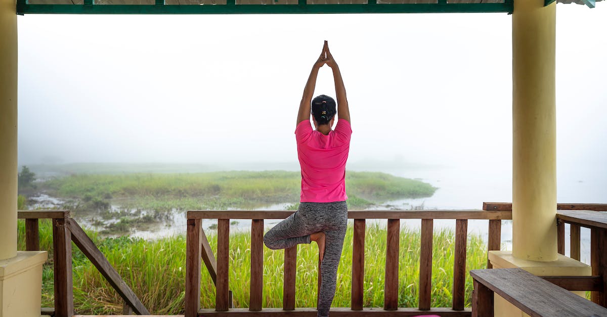 Cheapest/fastest way to raise a Mind Mag? - Unrecognizable woman doing Vriksasana pose on terrace