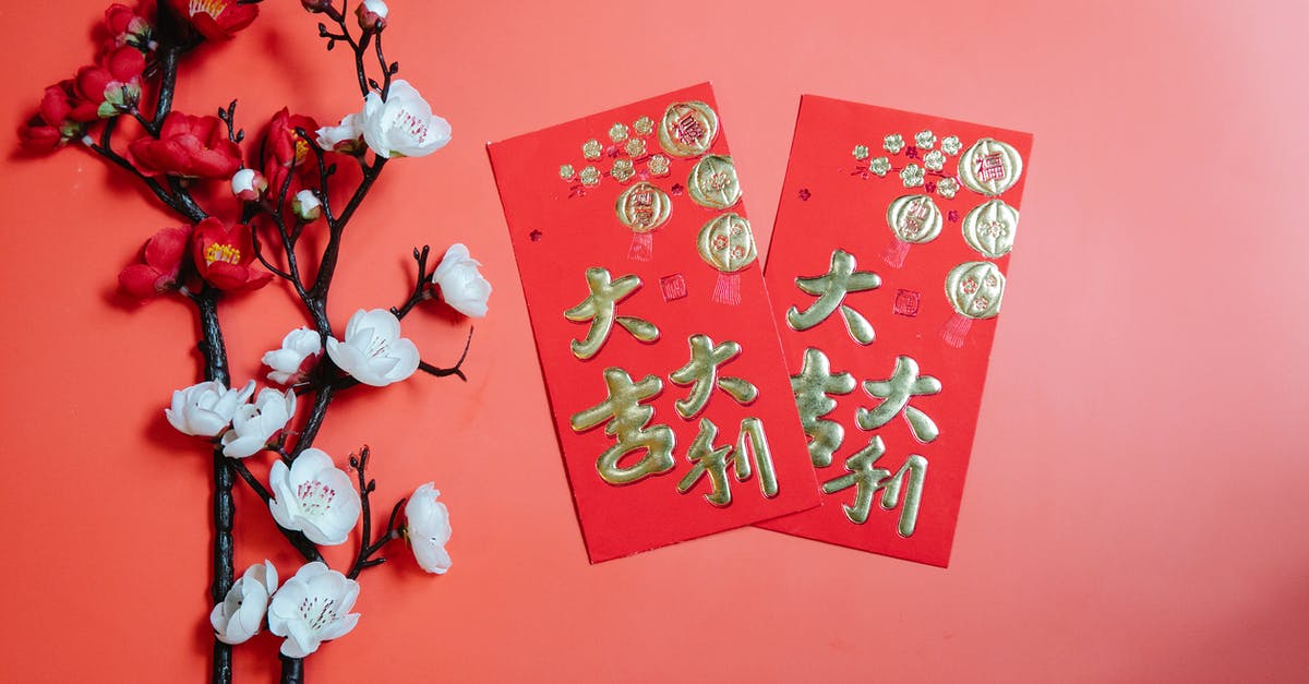 Chinese game similar to Minecraft - Oriental envelopes against decorative blooming Prunus on red background Chinese game similar to Minecraft - Oriental envelopes against decorative blooming Prunus on red background