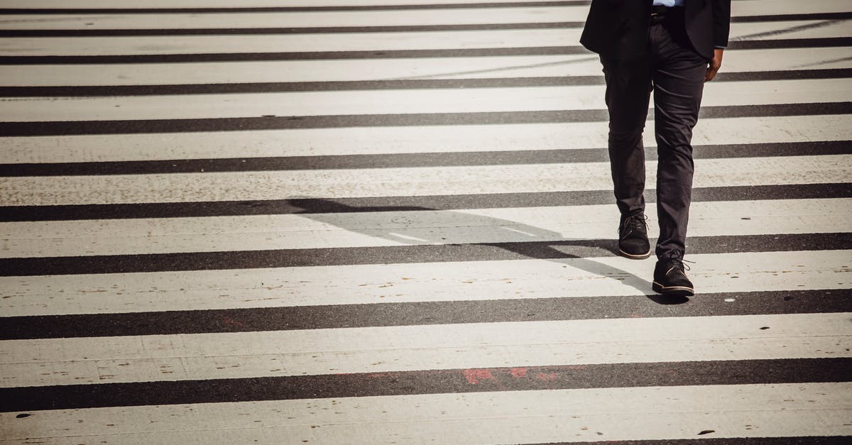 Citizens do not use the road I made for them in Cities Skylines - Faceless businessman with smartphone walking on crosswalk in sunlight Citizens do not use the road I made for them in Cities Skylines - Faceless businessman with smartphone walking on crosswalk in sunlight