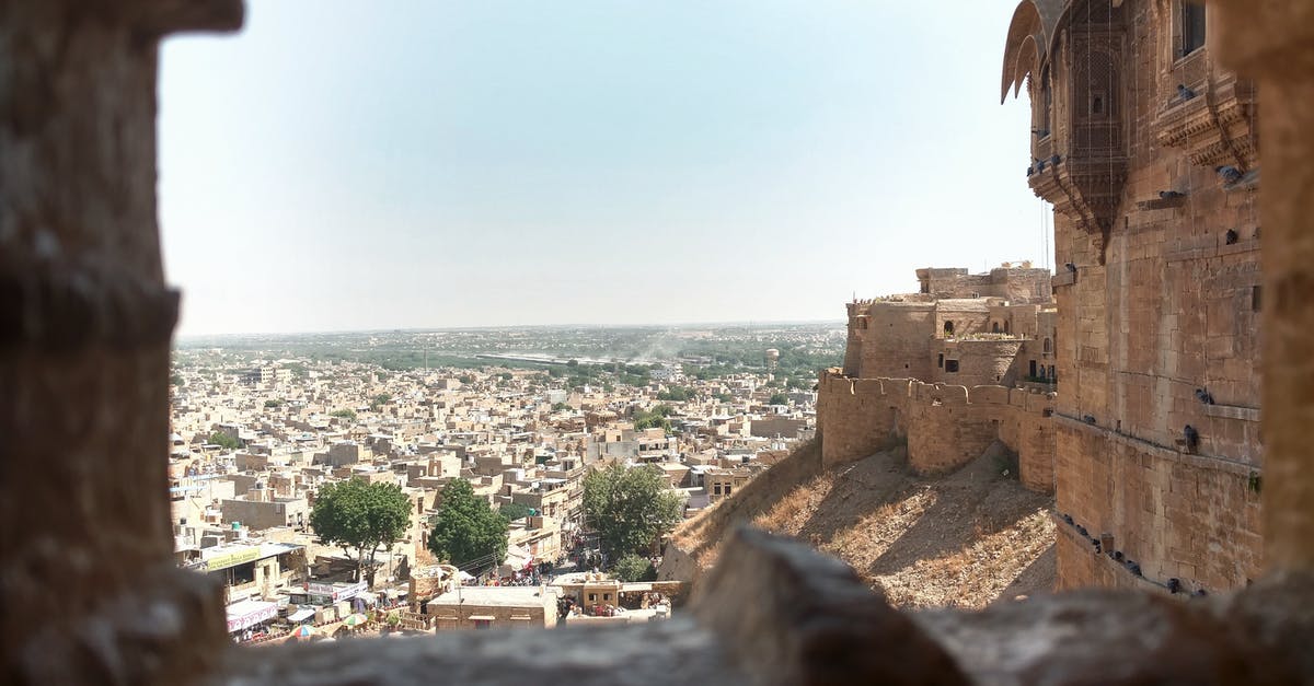 Civilization 5 Start Location - Distant ancient stone buildings of aged town with wall of medieval fort in India Civilization 5 Start Location - Distant ancient stone buildings of aged town with wall of medieval fort in India