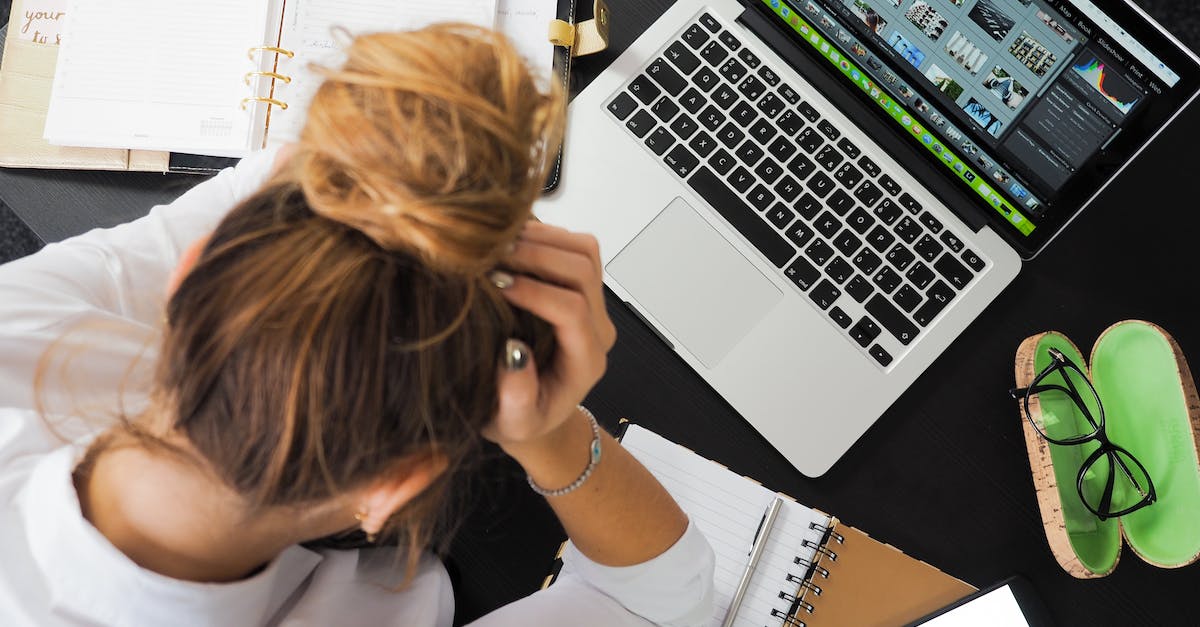 CK2: technology screen - Woman Sitting in Front of Macbook