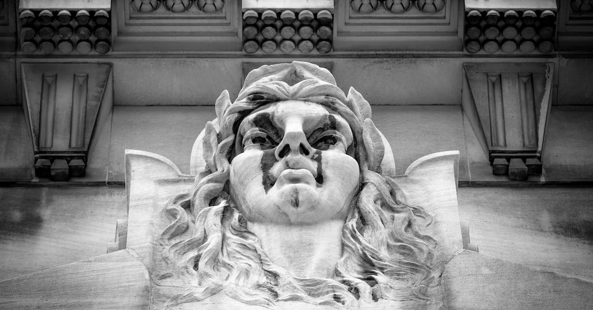 Clan wars in clash of clans - Grayscale Photo of a Concrete Statue Clan wars in clash of clans - Grayscale Photo of a Concrete Statue