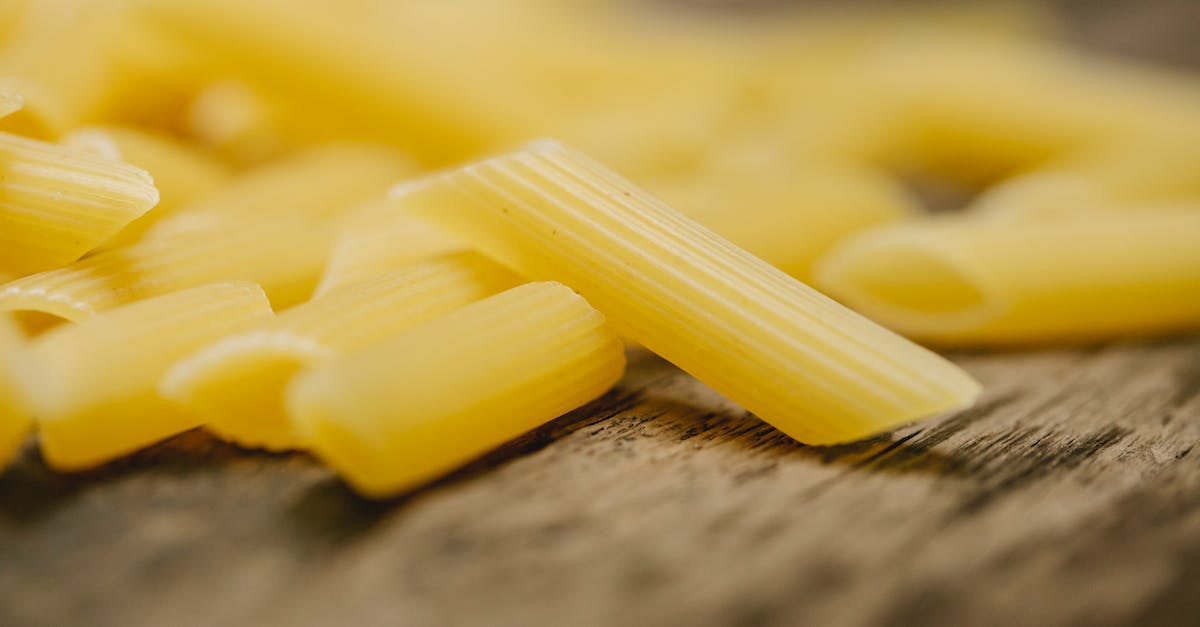 Clash of clans base layout types? - Raw penne pasta scattered on table