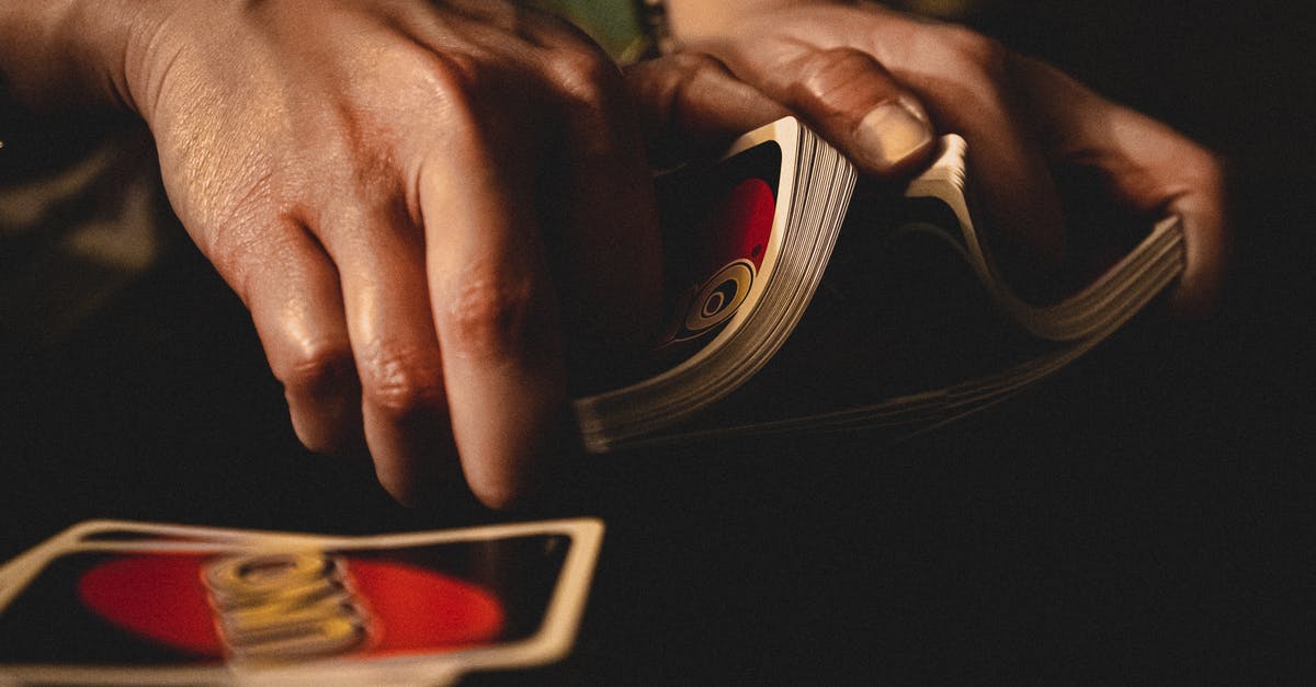 Clash Royale cards shuffle - Person Shuffling Uno Cards