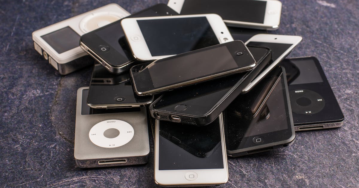 Clicked "Off" on full screen button and now my screen is black. What do I do? - Pile of old smartphones and music players
