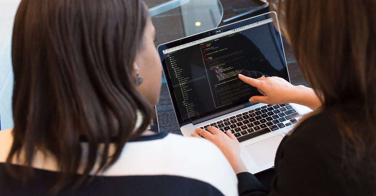 Code builder not working in Code Town - Two Women Looking at the Code at Laptop