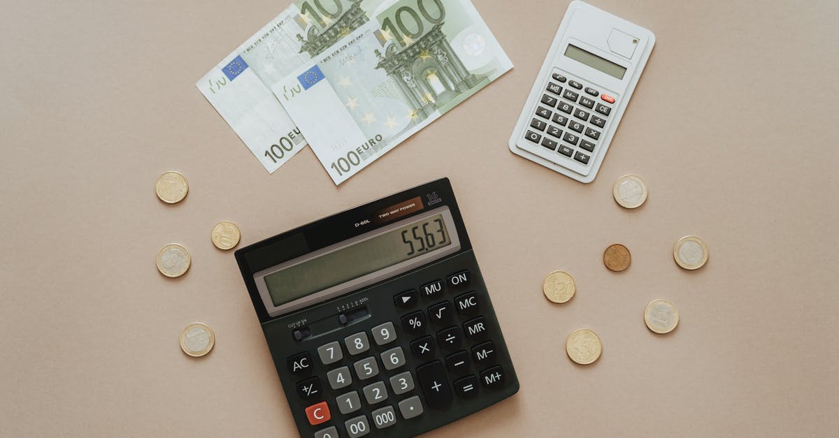 Coins displaying as popsicles? - Black and Silver Calculator Beside Silver Coins Coins displaying as popsicles? - Black and Silver Calculator Beside Silver Coins