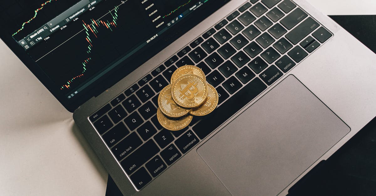 Coins displaying as popsicles? - Gold Bitcoins on Laptop with Graph on Screen Coins displaying as popsicles? - Gold Bitcoins on Laptop with Graph on Screen