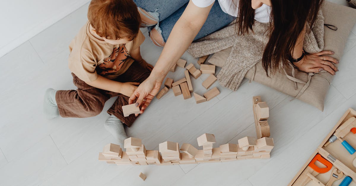 Command Blocks vs Bukkit Plugin, Performance? - Woman Playing with Toy Blocks with Son