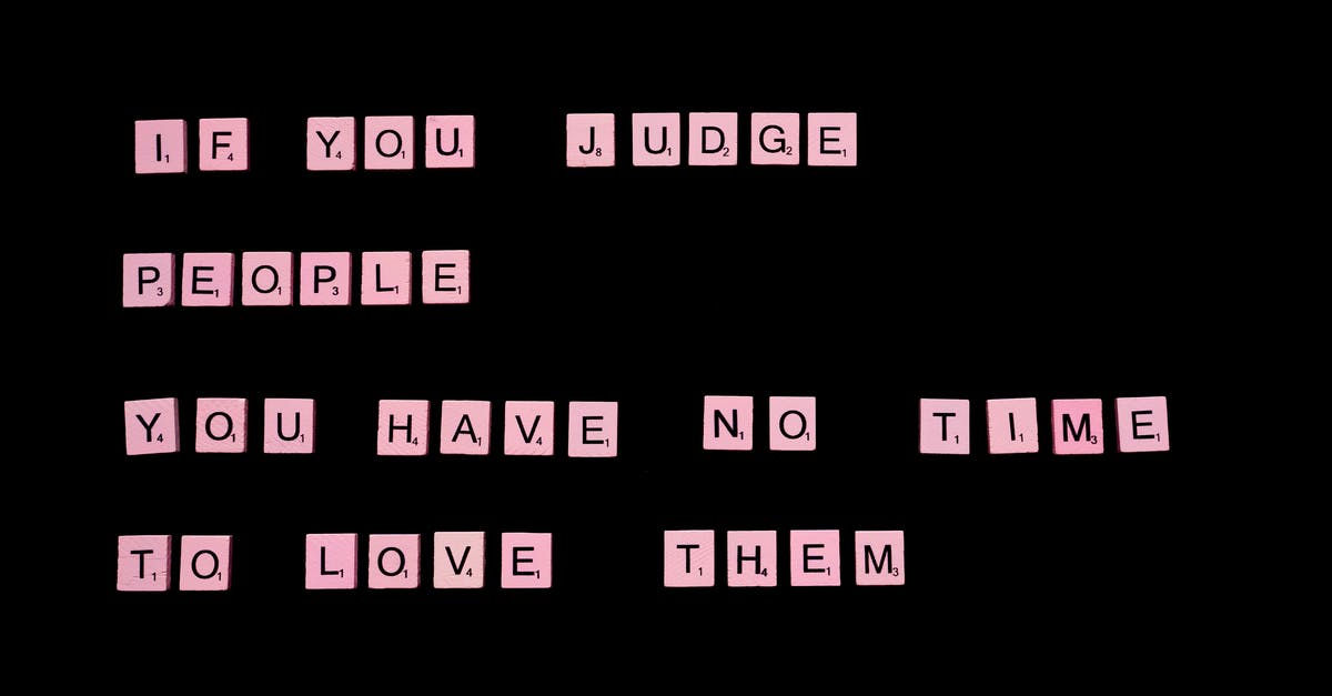 Condition Zero game "HD Models" option makes no difference at all - If You Judge People You Have No Time To Love Them text spelled out with pink letter tiles of famous word game against black background