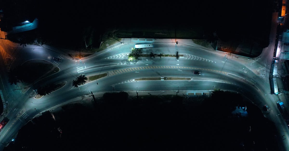 Connect to highway coming from outside city limits [duplicate] - Night illuminated motorway in city