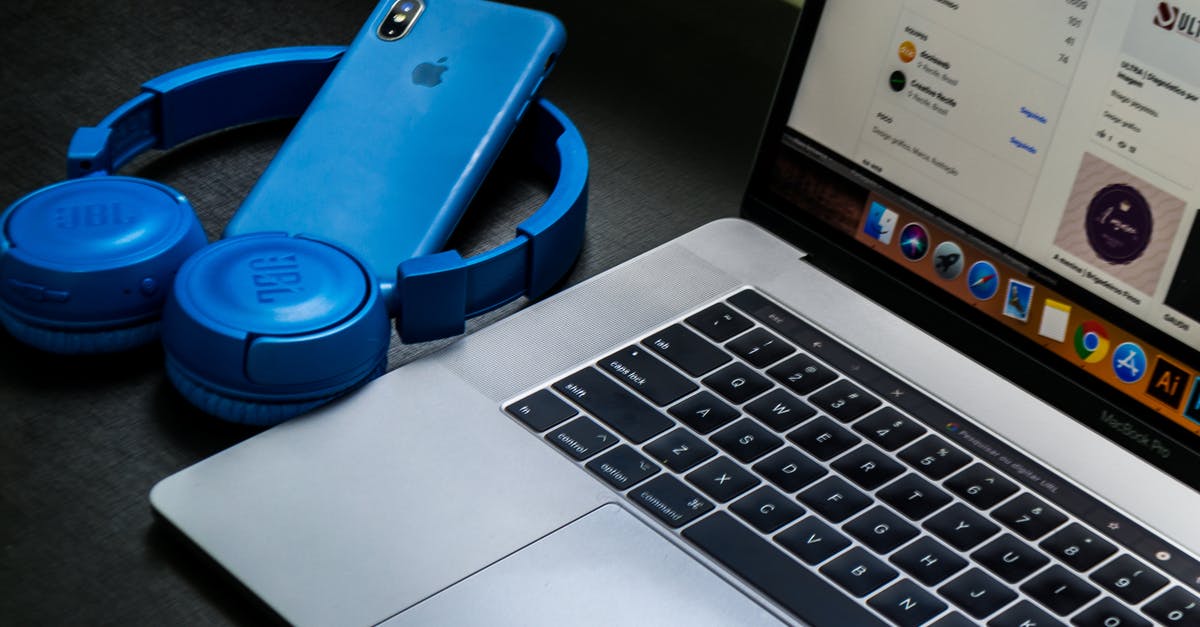 Connect Wii classic controller to Mac X OS Yosemite - Macbook Pro Beside Blue Wireless Headphones Connect Wii classic controller to Mac X OS Yosemite - Macbook Pro Beside Blue Wireless Headphones