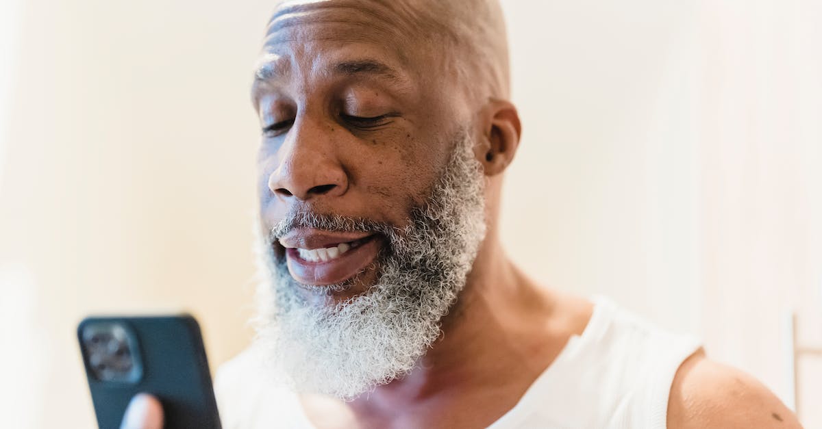 Connection to own Q3 dedicated impossible - Man in Tank Top Talking on Smartphone