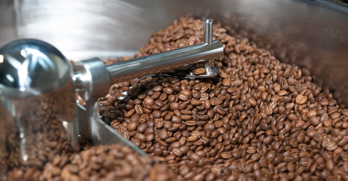 Cooling an insulated tile? - Brown Coffee Beans on Stainless Steel Round Tray Cooling an insulated tile? - Brown Coffee Beans on Stainless Steel Round Tray