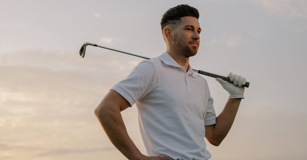 Coordinate of player standing on a certain block - A Man Holding a Golf Club