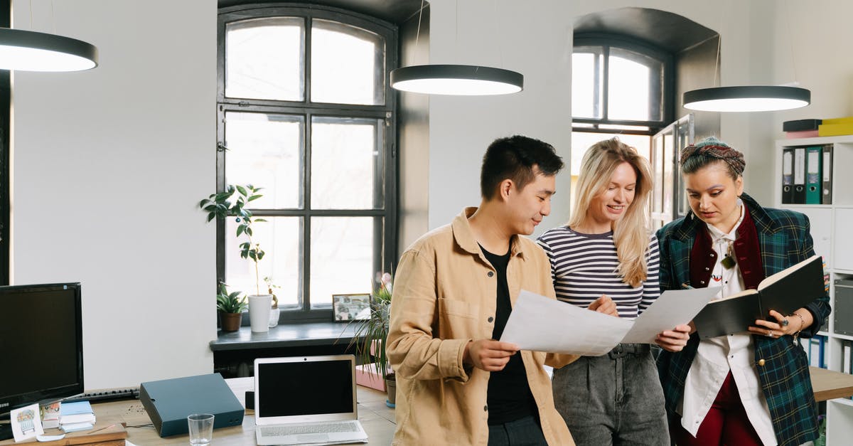 Cost scaling and optimal strategy for synthesis - Woman in Beige Coat Holding White Paper