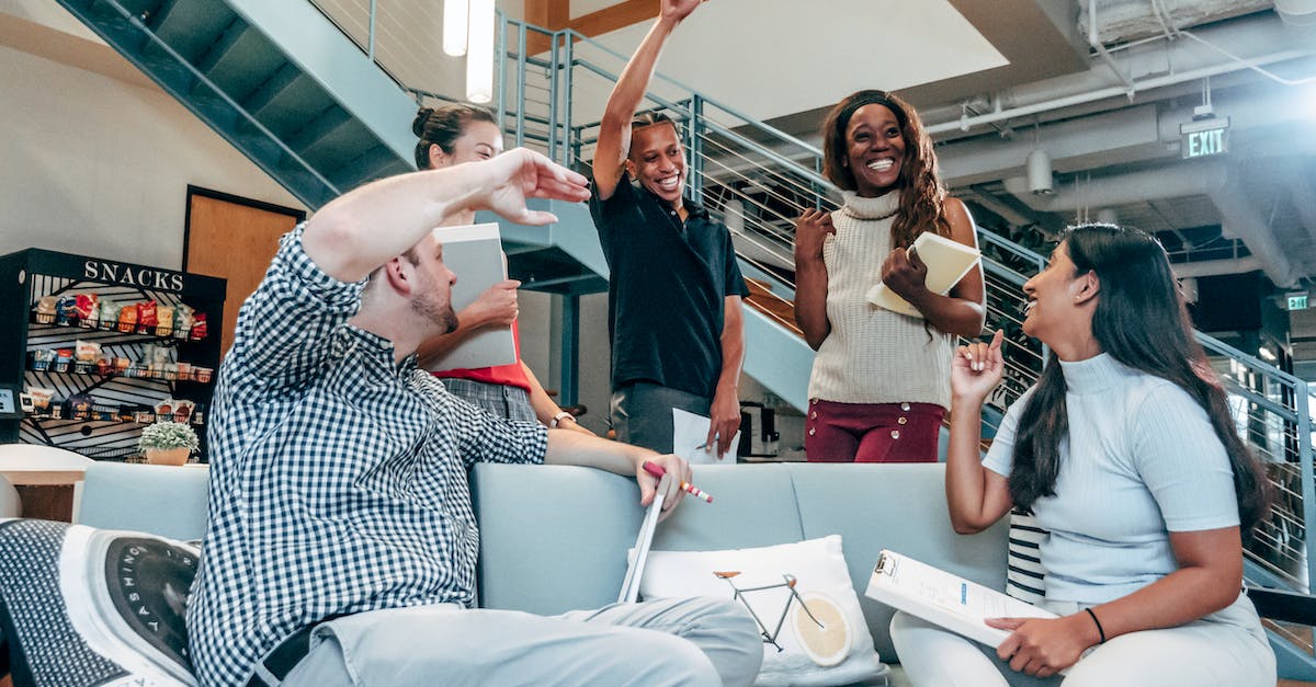 Couch co-op individual loot unbalanced? - Woman in Black and White Polka Dot Shirt Sitting on Bed