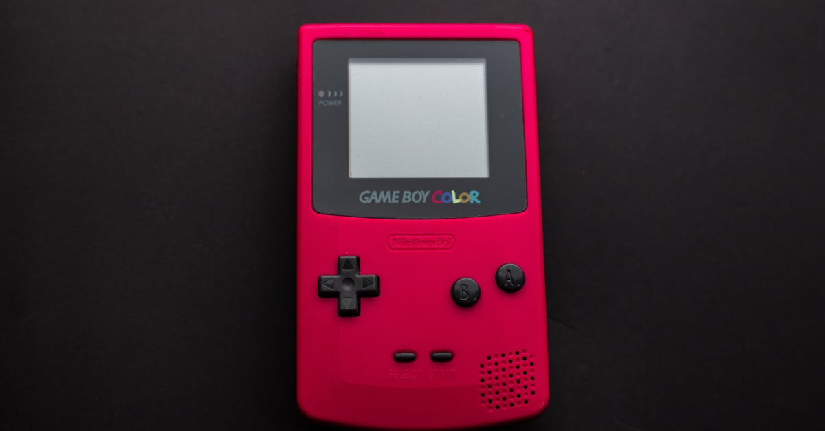 Could Removing A Nintendo Game Boy Game While The Console Is Powered-On Do Any Damage? - Close-up Photo of Red Game Boy Console Could Removing A Nintendo Game Boy Game While The Console Is Powered-On Do Any Damage? - Close-up Photo of Red Game Boy Console