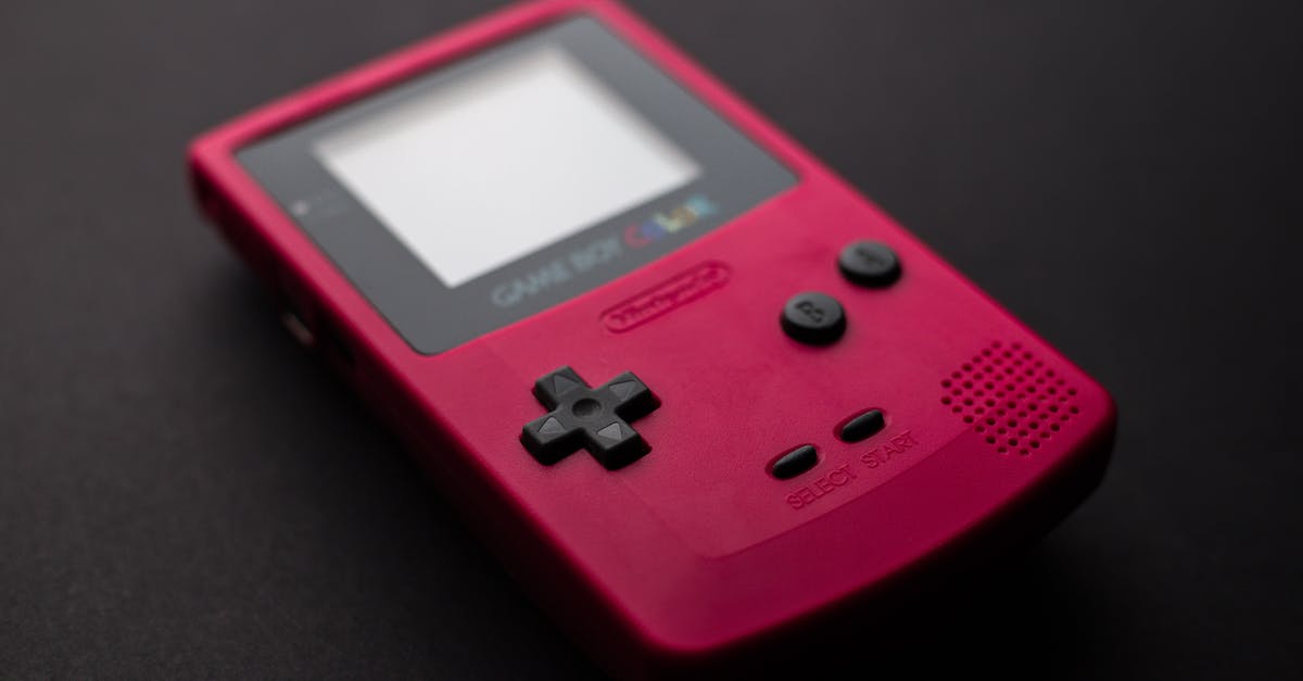 Could Removing A Nintendo Game Boy Game While The Console Is Powered-On Do Any Damage? - Close-up Photo of Red Game Boy Console Could Removing A Nintendo Game Boy Game While The Console Is Powered-On Do Any Damage? - Close-up Photo of Red Game Boy Console