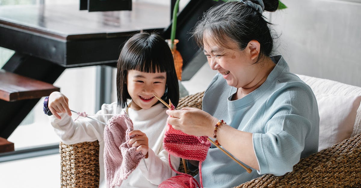 Crafting a greatsword Help - Happy woman and girl knitting at home Crafting a greatsword Help - Happy woman and girl knitting at home