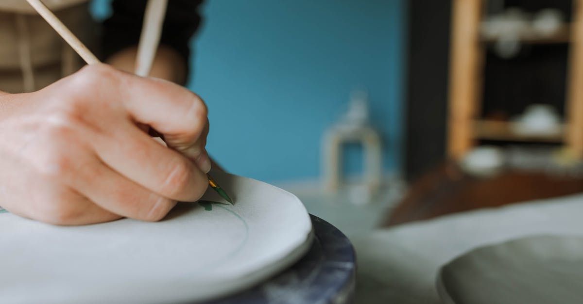 Crafting Glitch? - Person Holding White Paint Brush Crafting Glitch? - Person Holding White Paint Brush