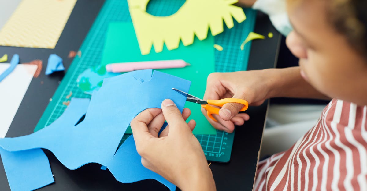 Crafting missing components - Person Holding Blue and Yellow Paint Brush