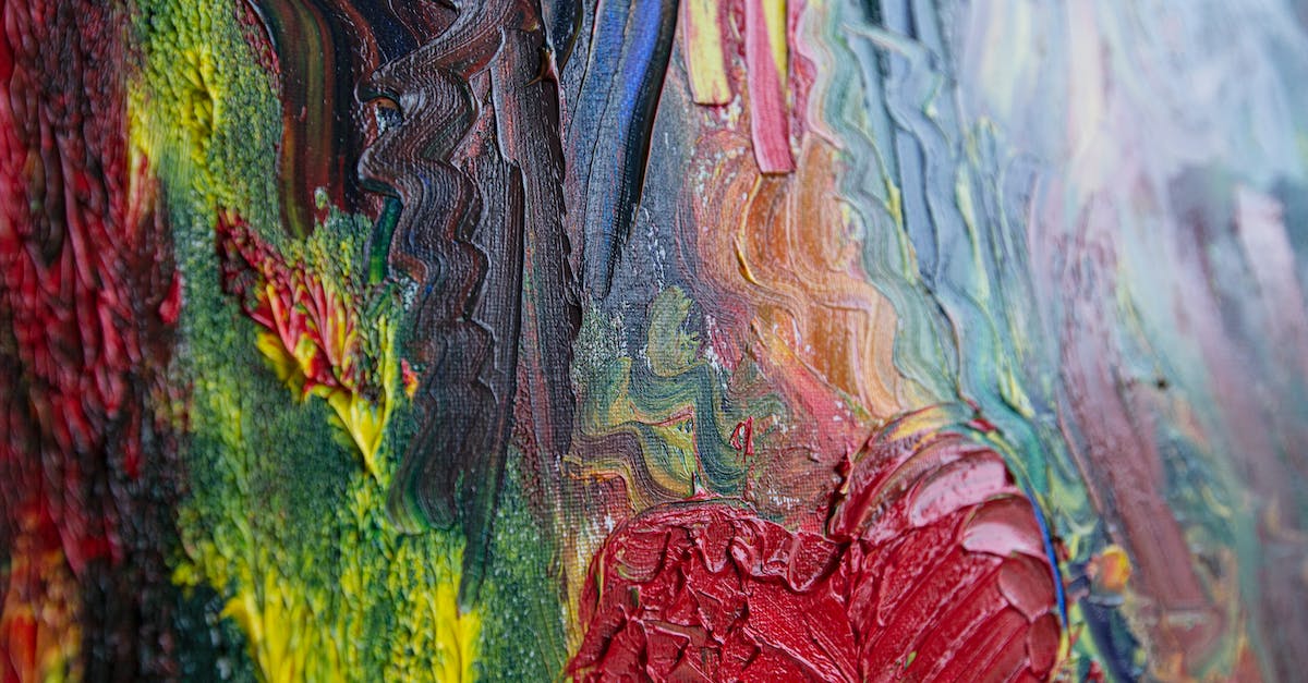 Create more hearts? - Colorful painting with smears of bright mixed paints with heart shaped drawing in creative art workshop with multicolored abstract artworks Create more hearts? - Colorful painting with smears of bright mixed paints with heart shaped drawing in creative art workshop with multicolored abstract artworks