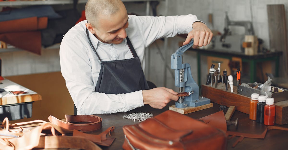 Create Official Dedicated CS:GO Server - Cheerful craftsman attaching metal snaps on leather strip Create Official Dedicated CS:GO Server - Cheerful craftsman attaching metal snaps on leather strip