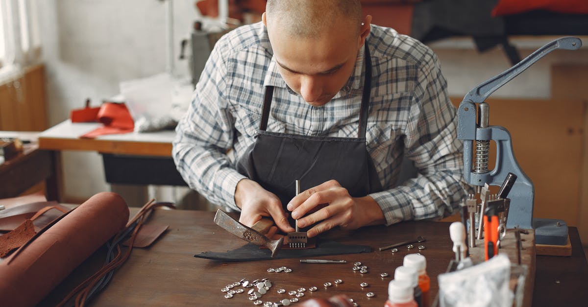 Create Official Dedicated CS:GO Server - Artisan attaching metal snaps on leather Create Official Dedicated CS:GO Server - Artisan attaching metal snaps on leather