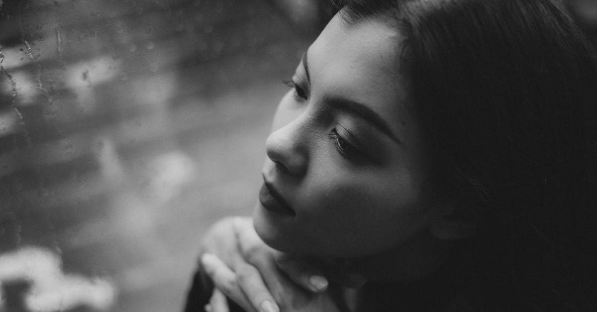 Creating a quest, problem with chips for pass weapons from subroom to subroom - Black and white high angle of serious teenage girl sitting in solitude near window covered with raindrops