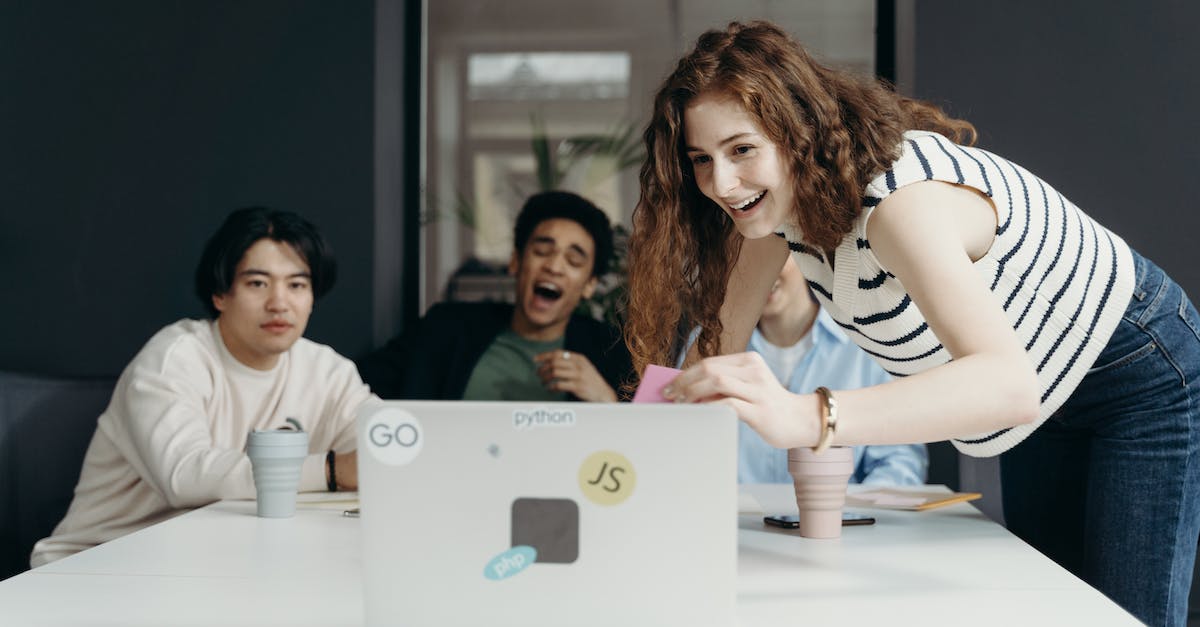 Creating a "custom" Caladbolg - People Laughing Looking at a Laptop