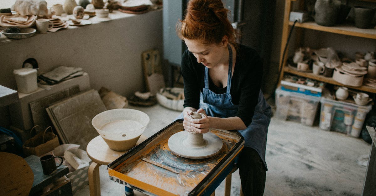 Creating a "custom" Caladbolg - Woman Holding Clay