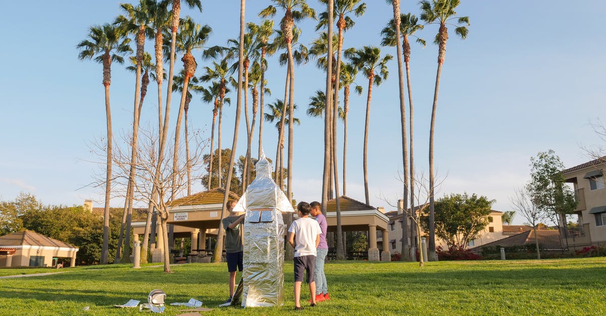 Creating space vacuum - Interracial Boys Building a Spaceship Project on Green Grass
