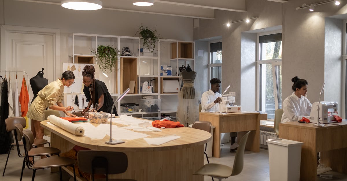 Creating space vacuum - People Working in an Atelier 