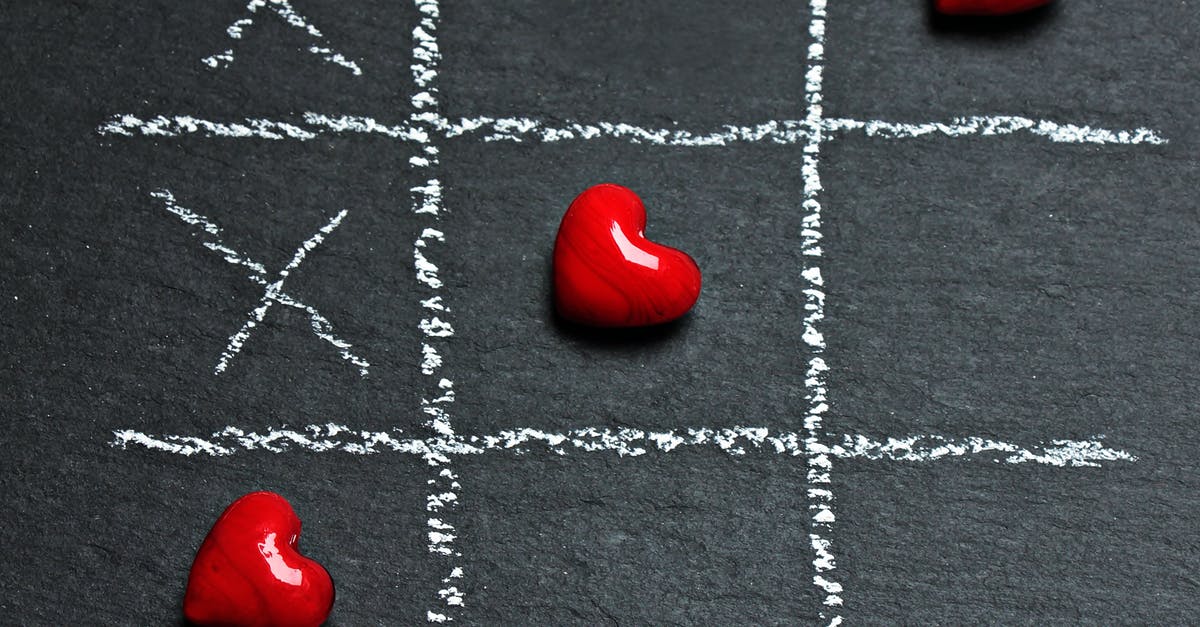 Cross play for ps3 and psvita - Three Heart-shaped Red Stones Placed on Tic-tac-toe Game Bord Cross play for ps3 and psvita - Three Heart-shaped Red Stones Placed on Tic-tac-toe Game Bord