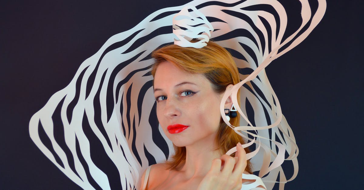 Crown Chest Cards - Clash Royale [duplicate] - Millennial female with red lips and paper crown representing queen of Renaissance epoch looking at camera