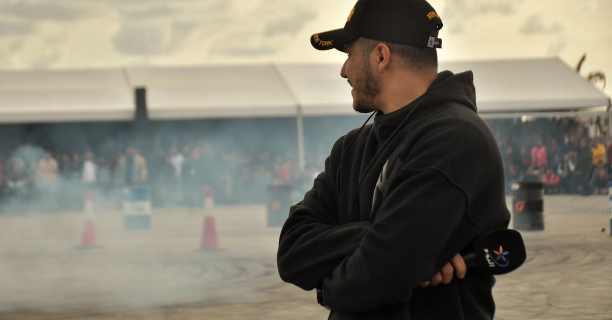 CS:GO Dust 2 smokes - Man in Black Jacket and Black Cap Standing Near Body of Water CS:GO Dust 2 smokes - Man in Black Jacket and Black Cap Standing Near Body of Water