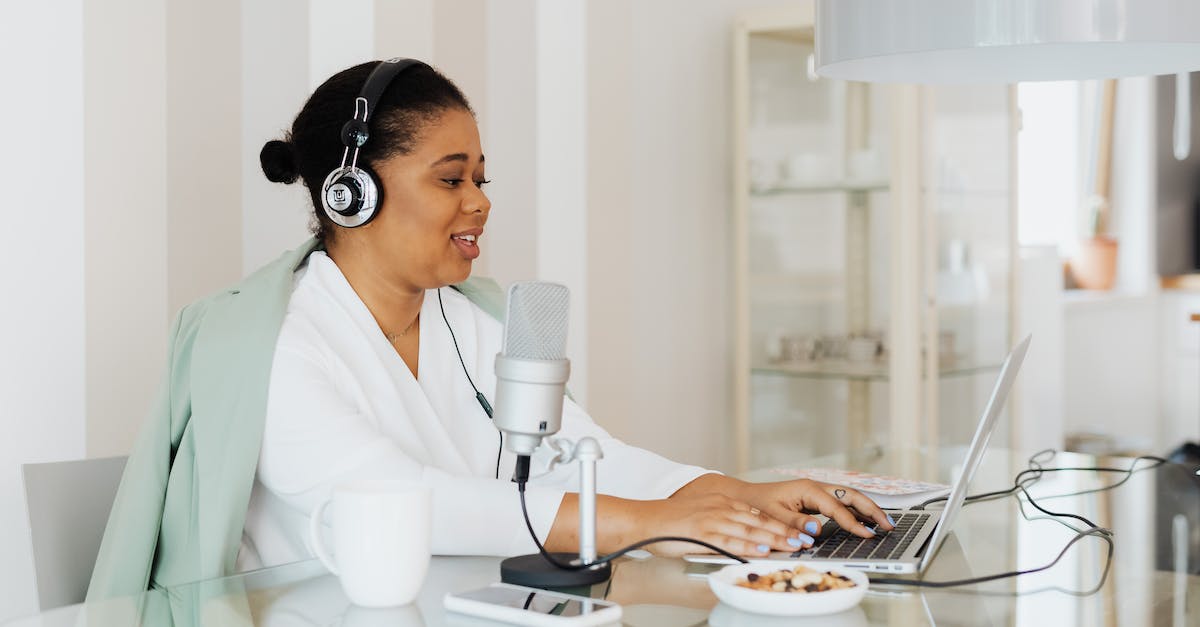 CSGO Mic Setup menu not working - Woman Sitting Behind a Desk Wearing Headphones and Using a Microphone and LaptopĀ CSGO Mic Setup menu not working - Woman Sitting Behind a Desk Wearing Headphones and Using a Microphone and LaptopĀ