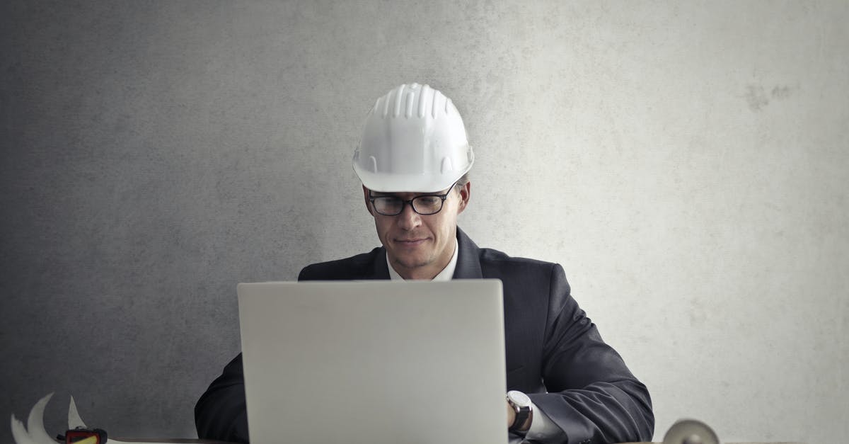CS:GO Online Players vs Expert Bots - Engineer working with laptop at table