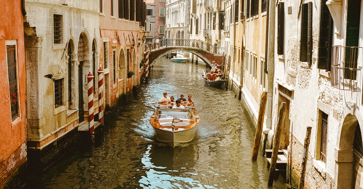 Cultural Buildings and Hired Armies - Photo Of People Riding Boat During Daytime Cultural Buildings and Hired Armies - Photo Of People Riding Boat During Daytime