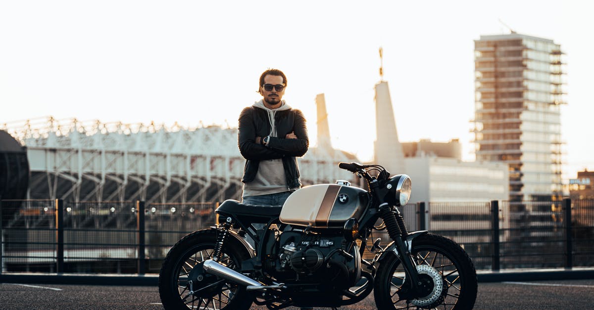Custom skins in MineCraft - Man Standing Beside Motorcycle