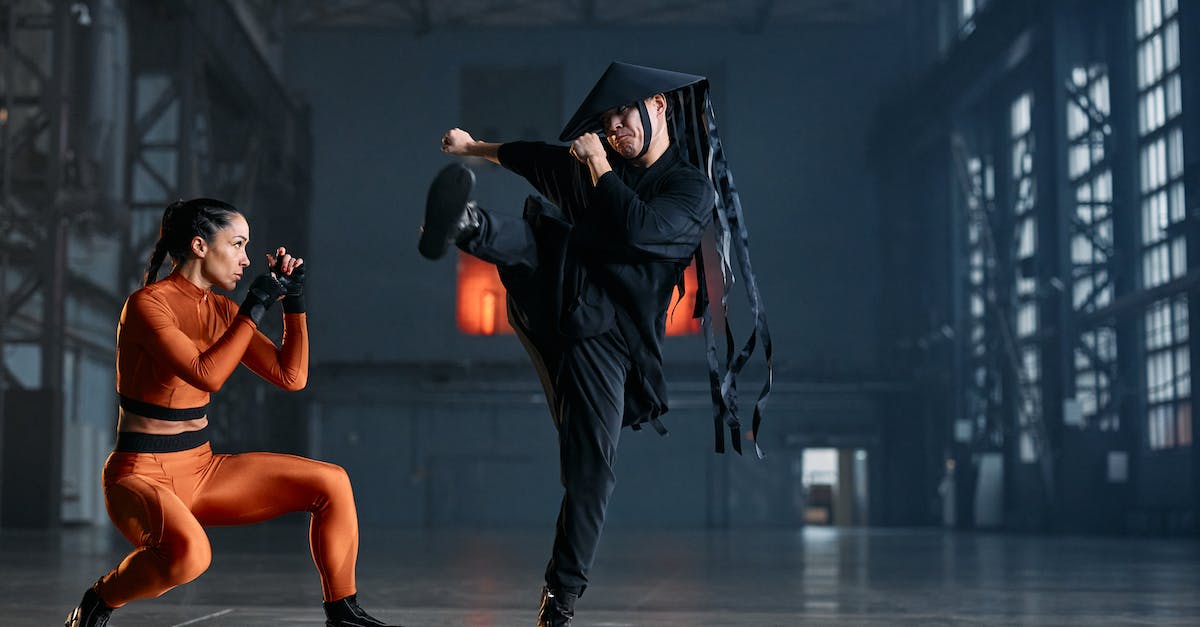 Cycling through attack modifiers in Dota 2 - Man in Black Long Sleeve Shirt and Black Hat