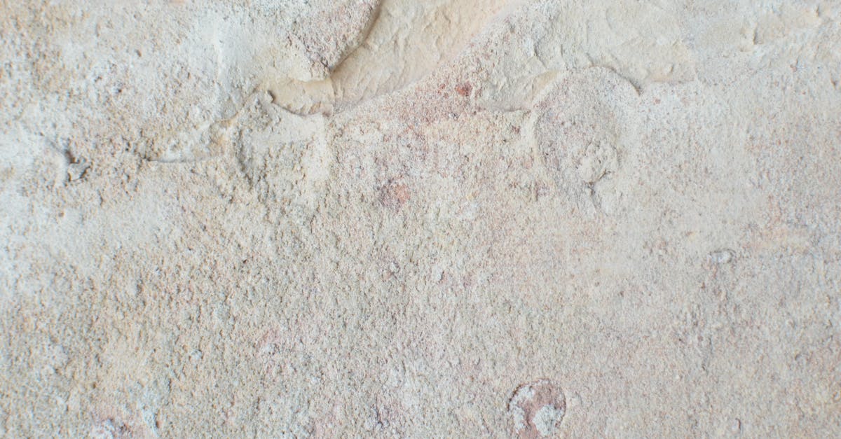 Damage from D.VA's Mech - From above of abstract backdrop of old wall with beige stucco and uneven surface with dense texture